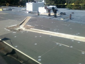 local massachusetts rubber roofing installation contractors working